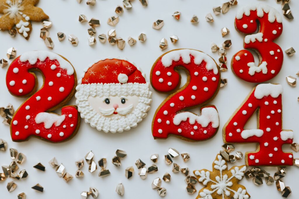 Christmas and New Year banner gingerbread cookies numbers 2023 change to 2024 on white background