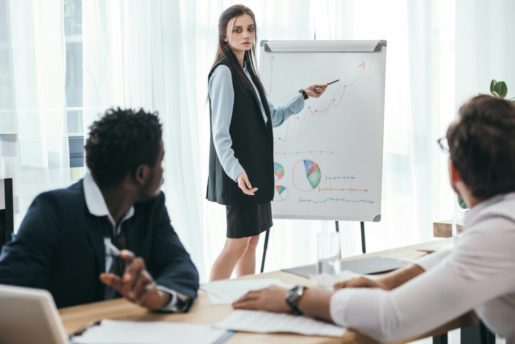 untidy tired businesspeople having presentation at office