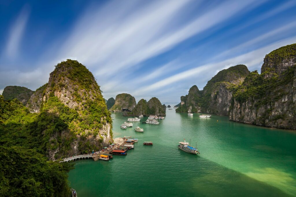 The beautiful Ha Long Bay in Vietnam. View of cruise ships and islands