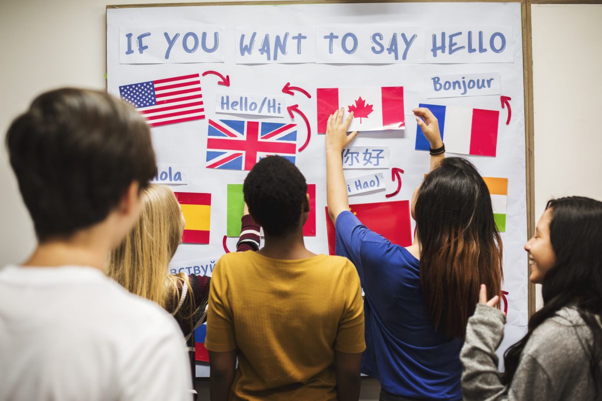 Teenager people at the national flags board